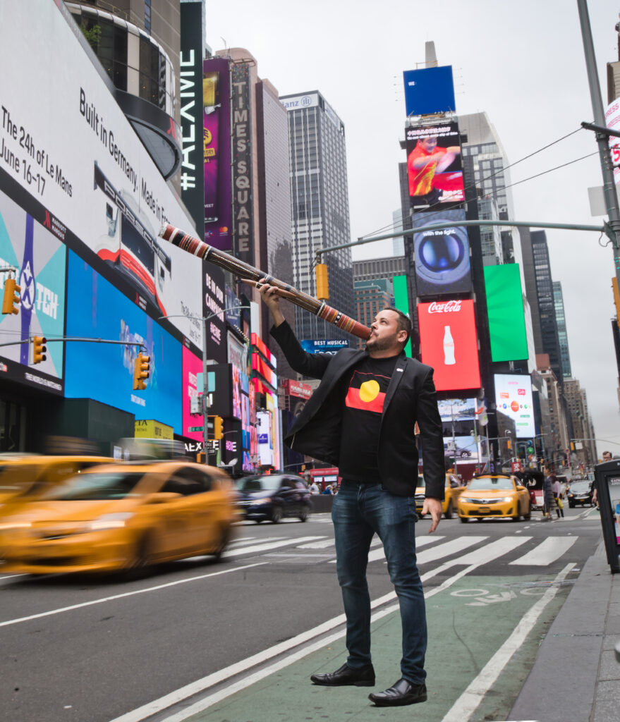 David Willliams Didgeridoo in Times Square New York Gilimbaa