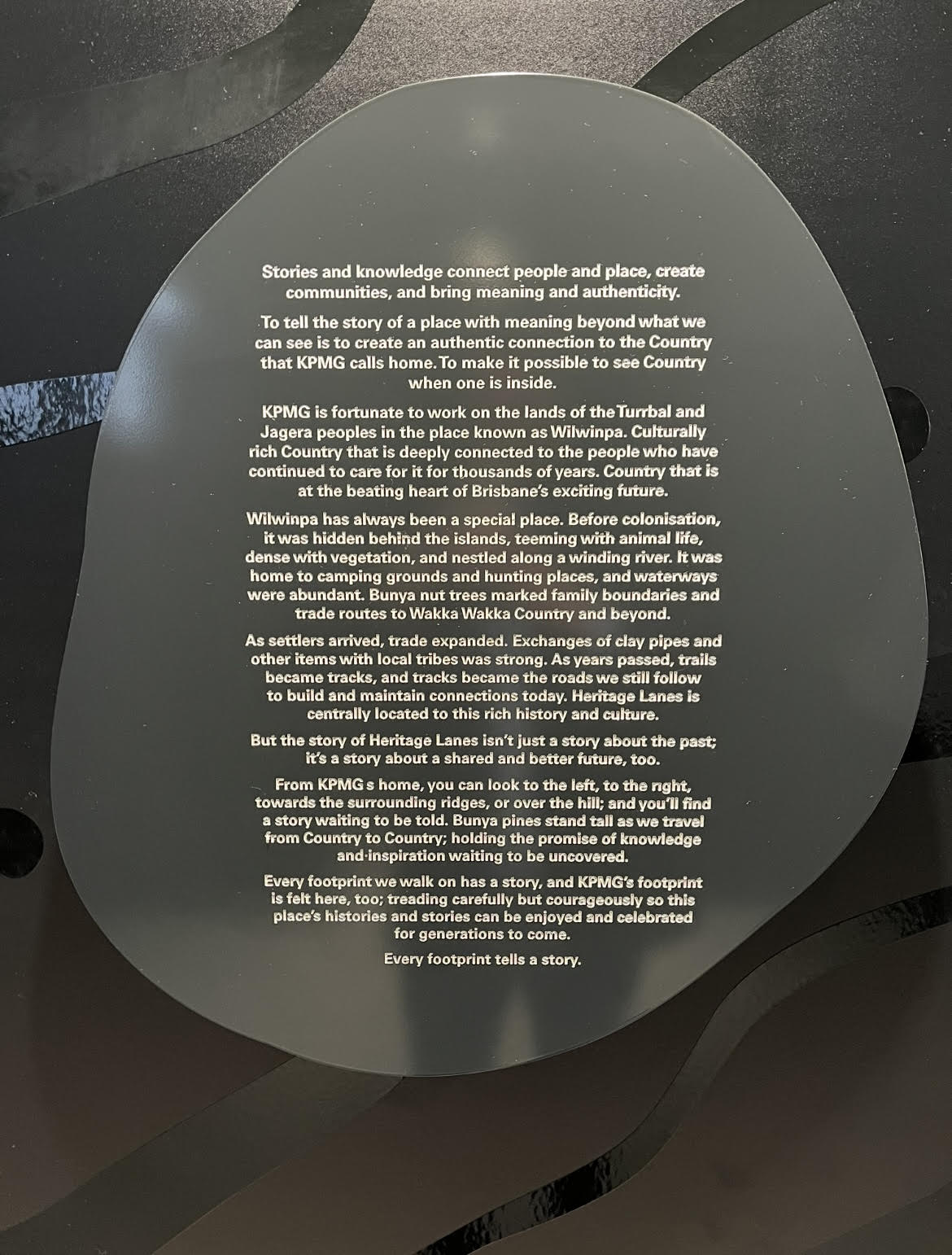 KPMG artwork story on plaque Gilimbaa